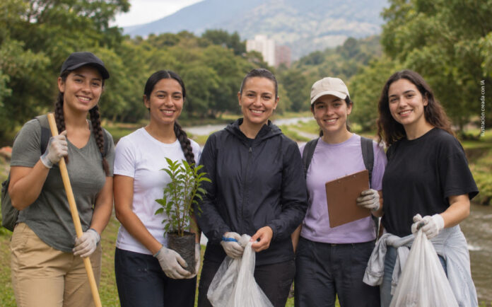 Grupo de mujeres participando en una jornada ambiental en Medellín, imagen representativa de la convocatoria Estímulos a los Talentos y Liderazgos de las Mujeres 2026.
