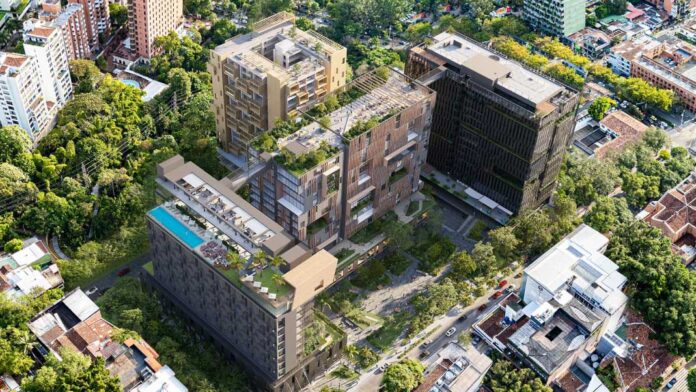 Render aéreo de Distrito Palermo y sus zonas verdes cerca del Parque Lleras, en El Poblado, Medellín.
